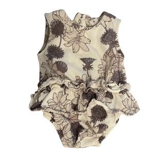 Kate Quinn skirted bodysuit